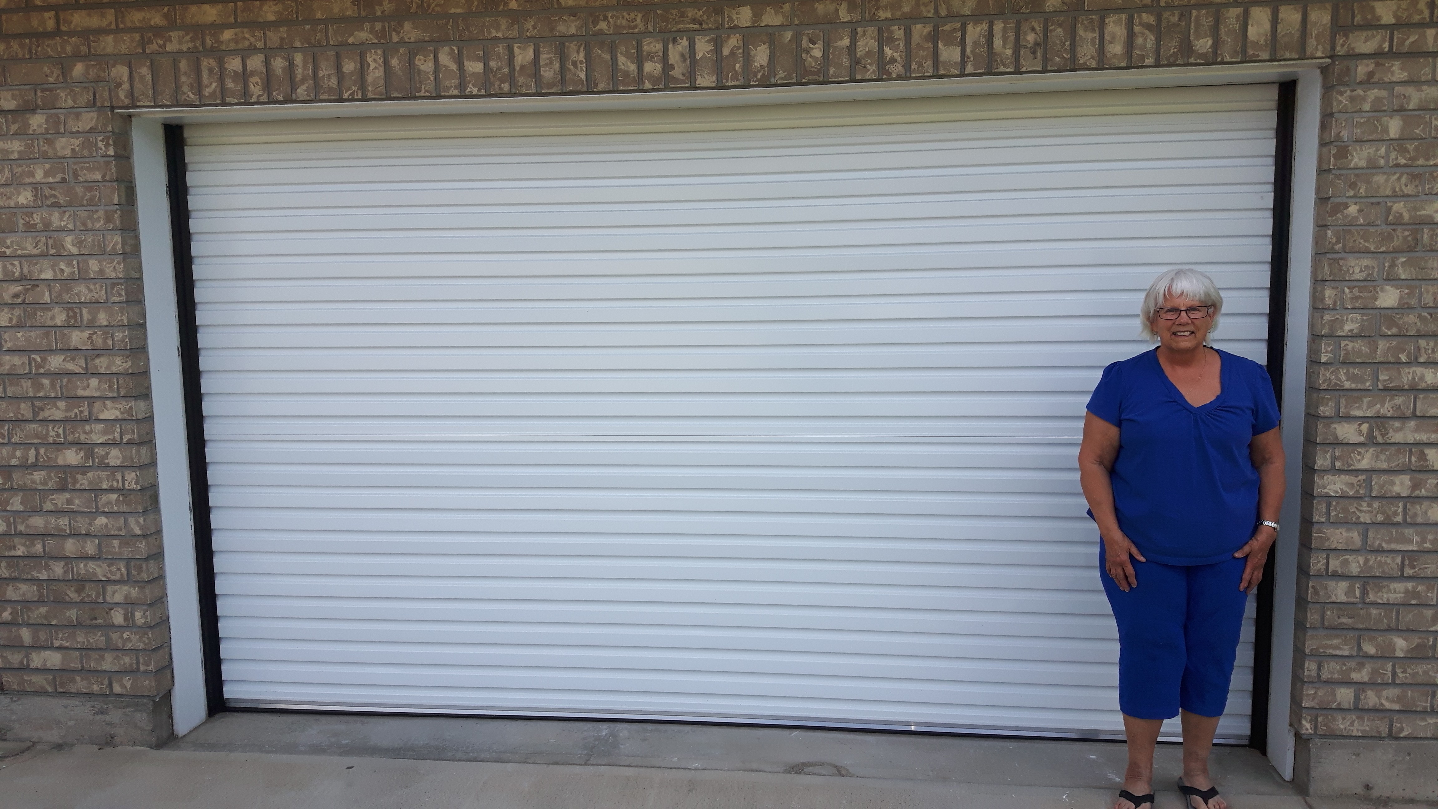 White steel roll up garage door