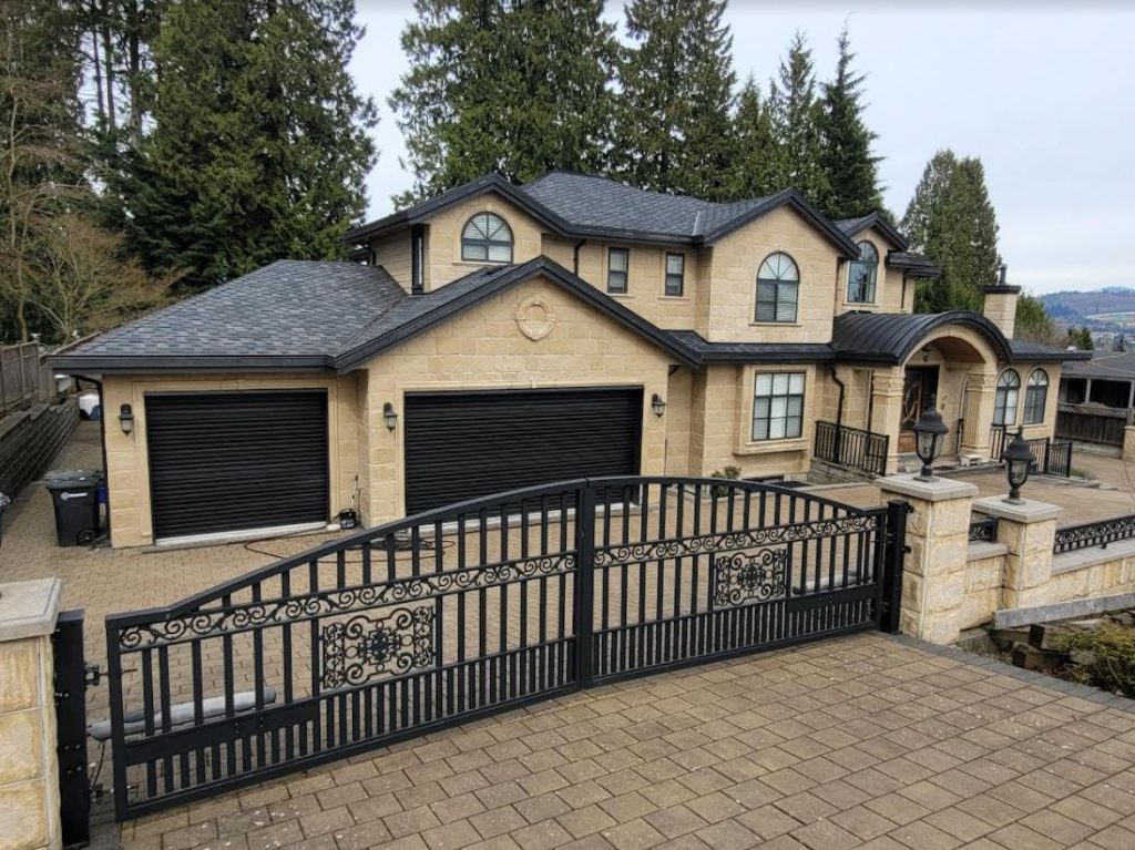 2 black garage doors side by side